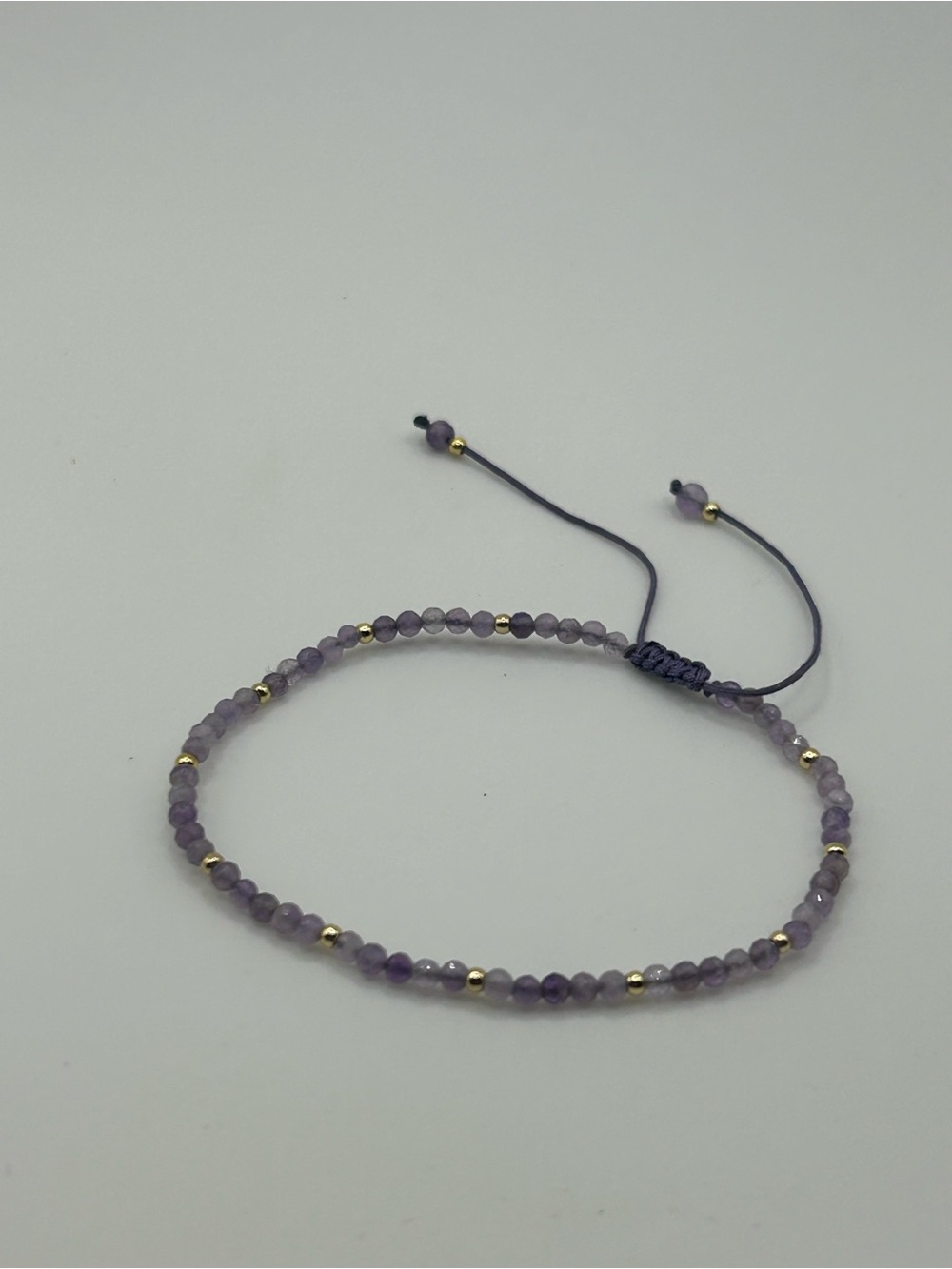#121087 Handmade Amehyst gold tone beads adjustable bracelet